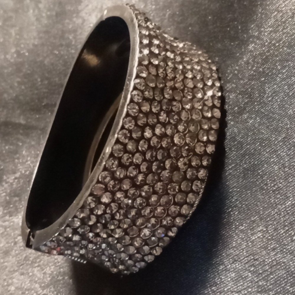 Crystal encrusted spring Hinged clamper bracelet oval shaped.comfort fit